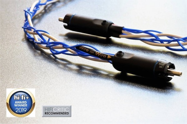 Wire on Wire's Experience880 interconnect is shown with its RCA terminations alongside its awards of audio cable of the year 2019 from Hi-Fi plus magazine